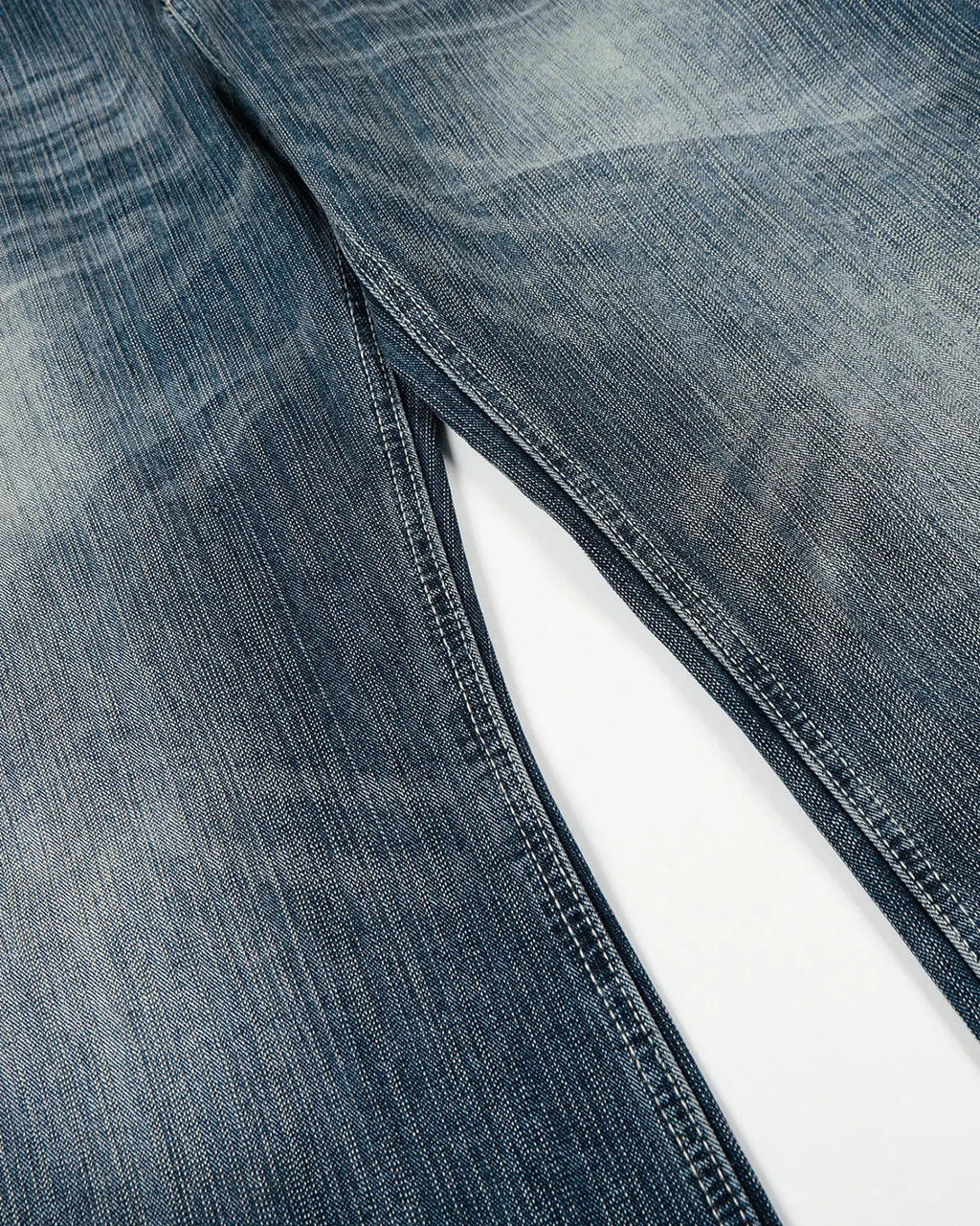 Blue textured bamboo weave denim jeans by Flation Streetwear, showing the relaxed fit and detailed fabric texture.