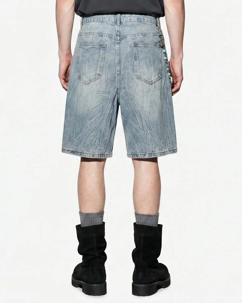 Blue textured washed longline jorts by Flation Streetwear, showing the relaxed fit and distressed denim style.