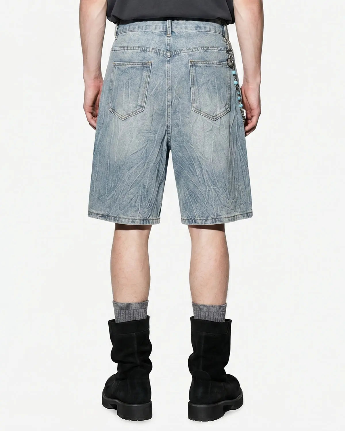 Blue textured washed longline jorts by Flation Streetwear, showing the relaxed fit and distressed denim style.