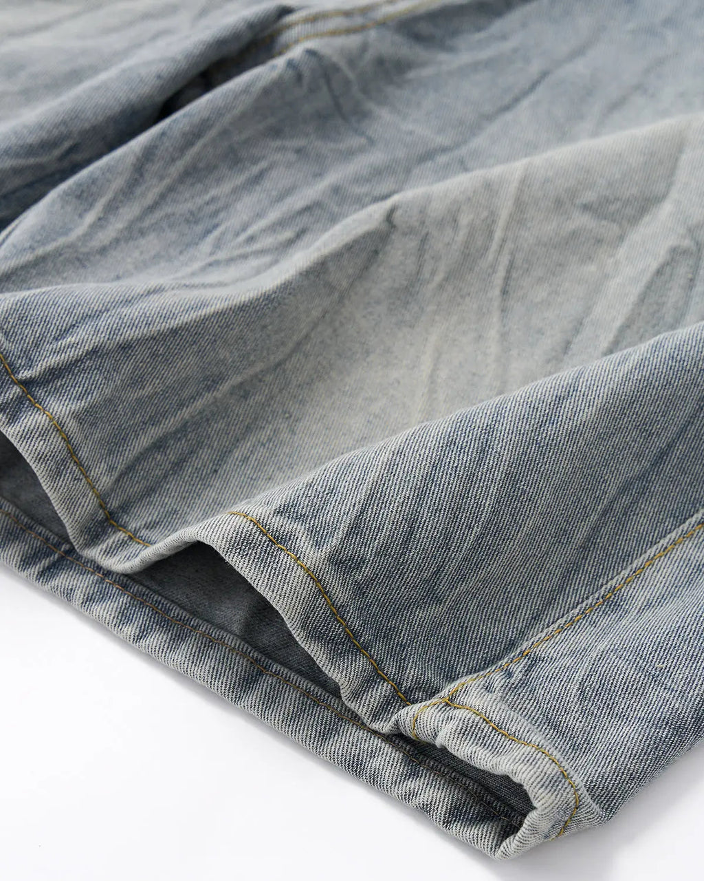 Blue textured washed longline jorts by Flation Streetwear, showcasing their relaxed fit and stylish distressed denim design.