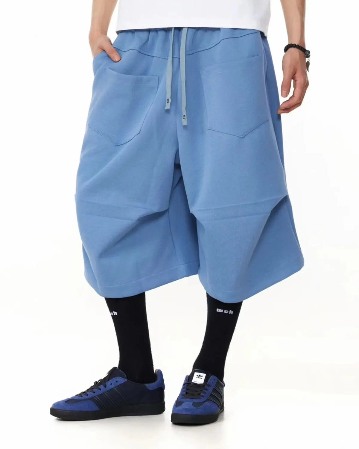 Grey Flation Baggy Sweat Shorts, relaxed-fit streetwear pants, featuring a soft fabric and comfortable waistband.
