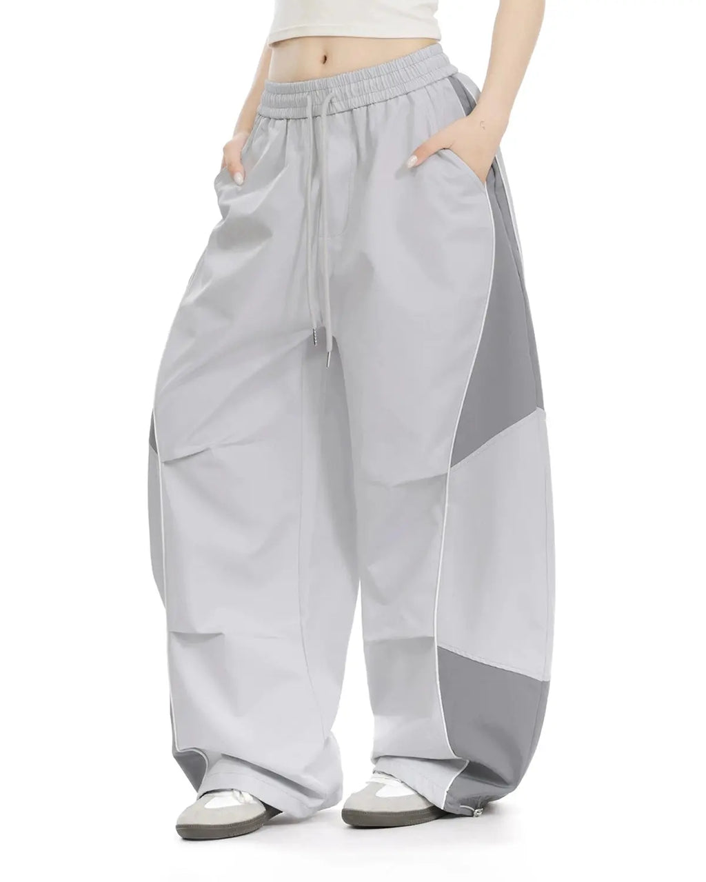 Grey Flation streetwear contrast panel baggy track pants, relaxed fit with stylish panel detailing, suitable for casual wear.