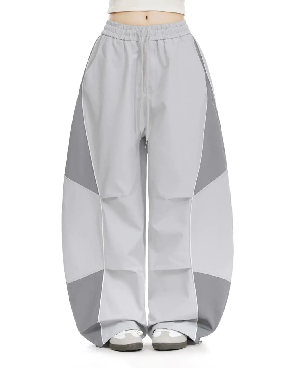 Grey Flation streetwear baggy track pants with contrast panel design, casual and comfortable for everyday wear.