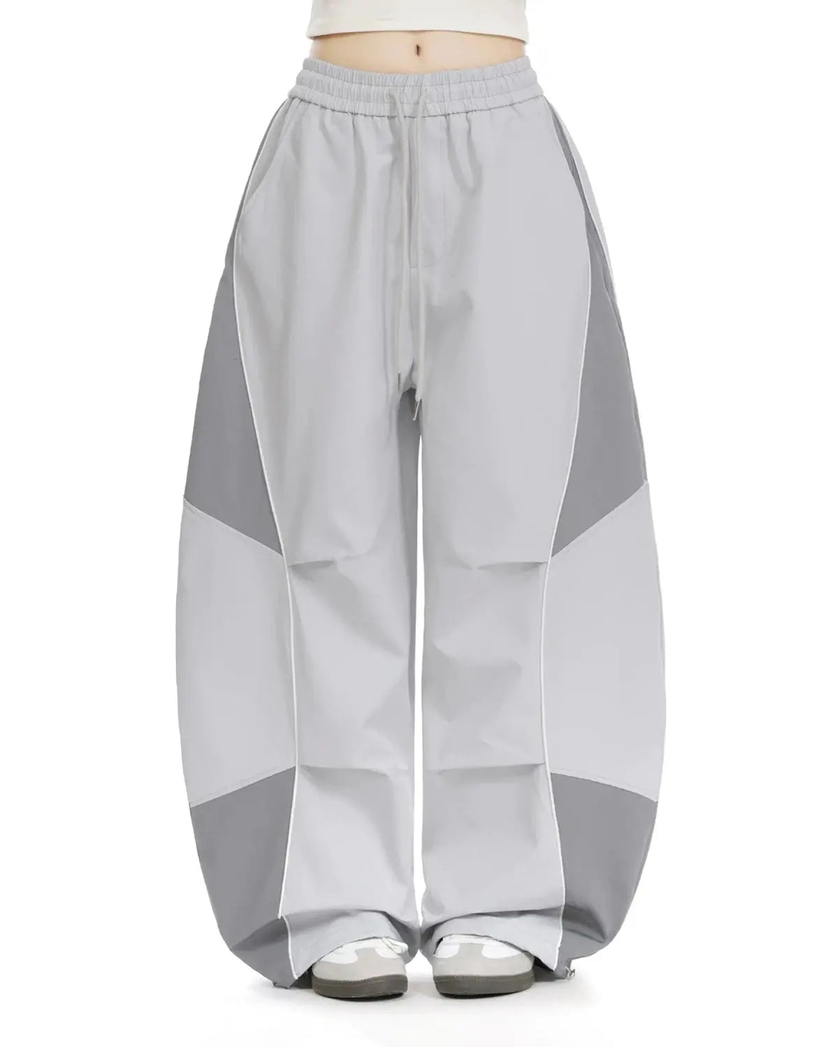 Grey Flation streetwear baggy track pants with contrast panel design, casual and comfortable for everyday wear.