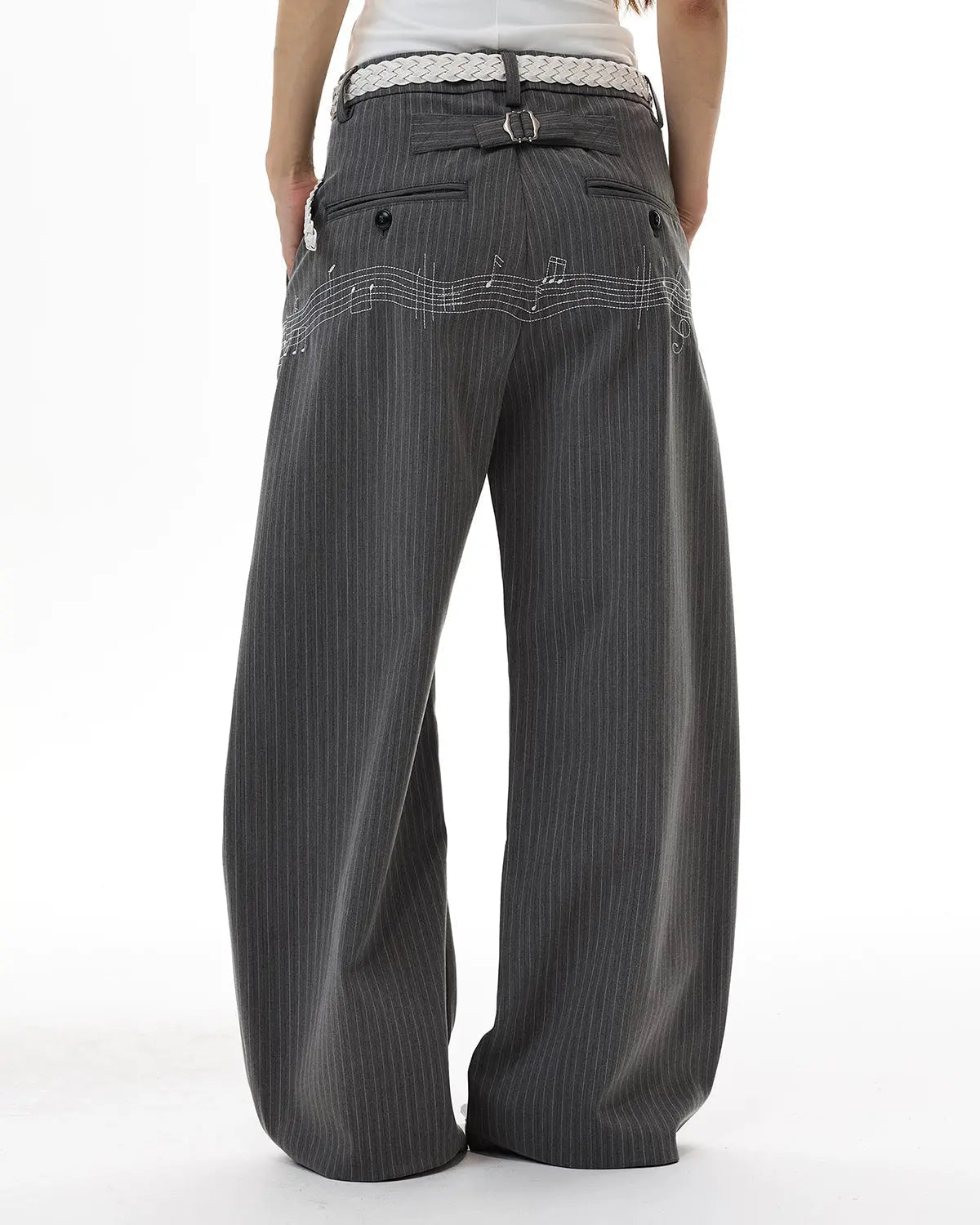 Flation pinstripe cinch back tailored pants with a high waist and sleek fit, featuring a classic pinstripe pattern and tailored design.