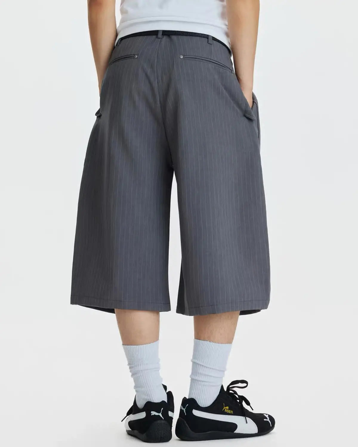 Flation pinstripe pleated tailored shorts with ring detail, stylish streetwear pants featuring a high waist and pleated design.