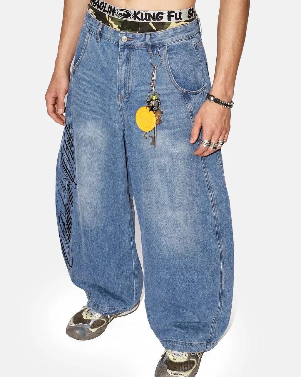 Inflation Script Graphic Barrel Jeans, men's streetwear pants with bold logo print and relaxed fit, made by INFLATION.