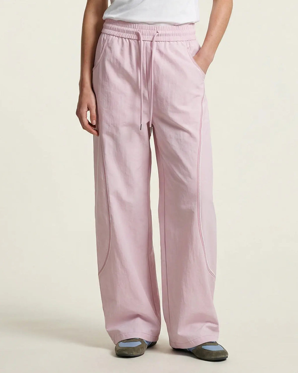Light grey Flation AirFlow Contrast Embroidered Track Pants with breathable fabric and stylish embroidery design.