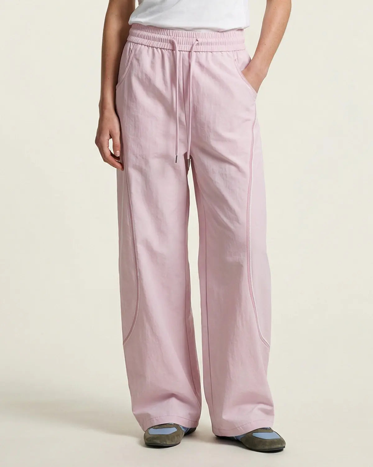 Light grey Flation AirFlow Contrast Embroidered Track Pants with breathable fabric and stylish embroidery design.