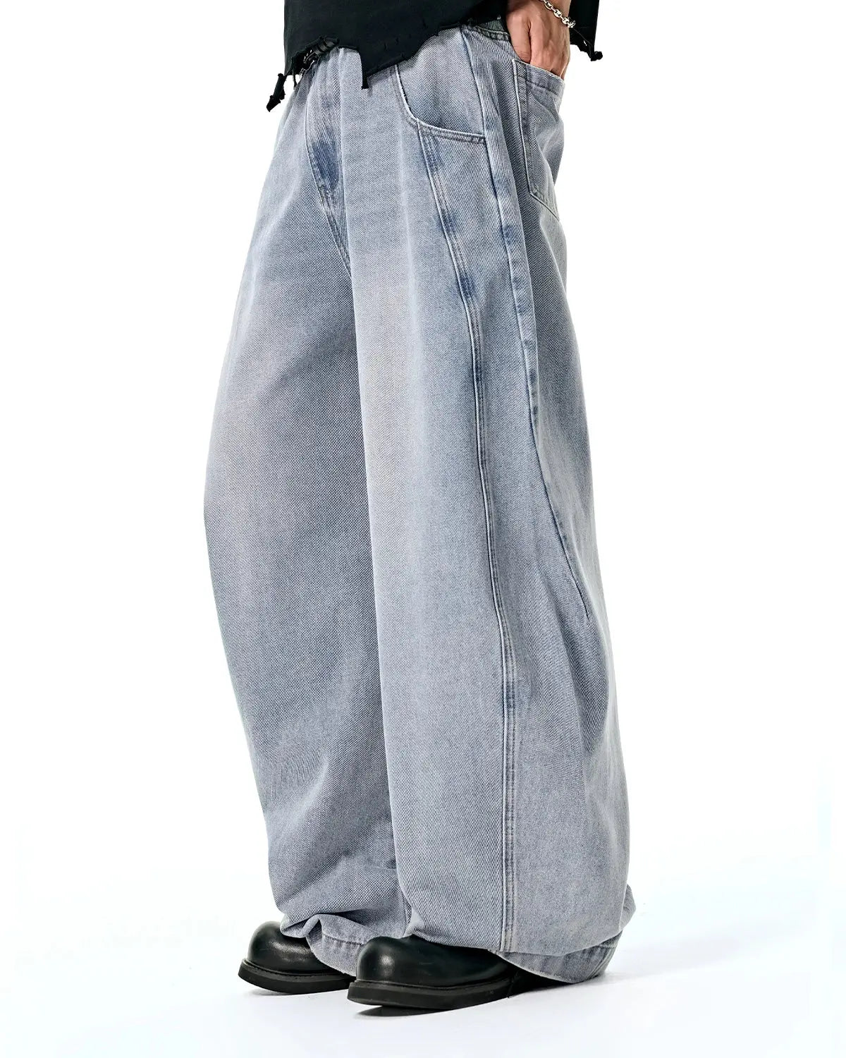 Light grey Flation Washed Barrel Baggy Jeans displaying relaxed, loose-fit pants with a casual wash and baggy style.