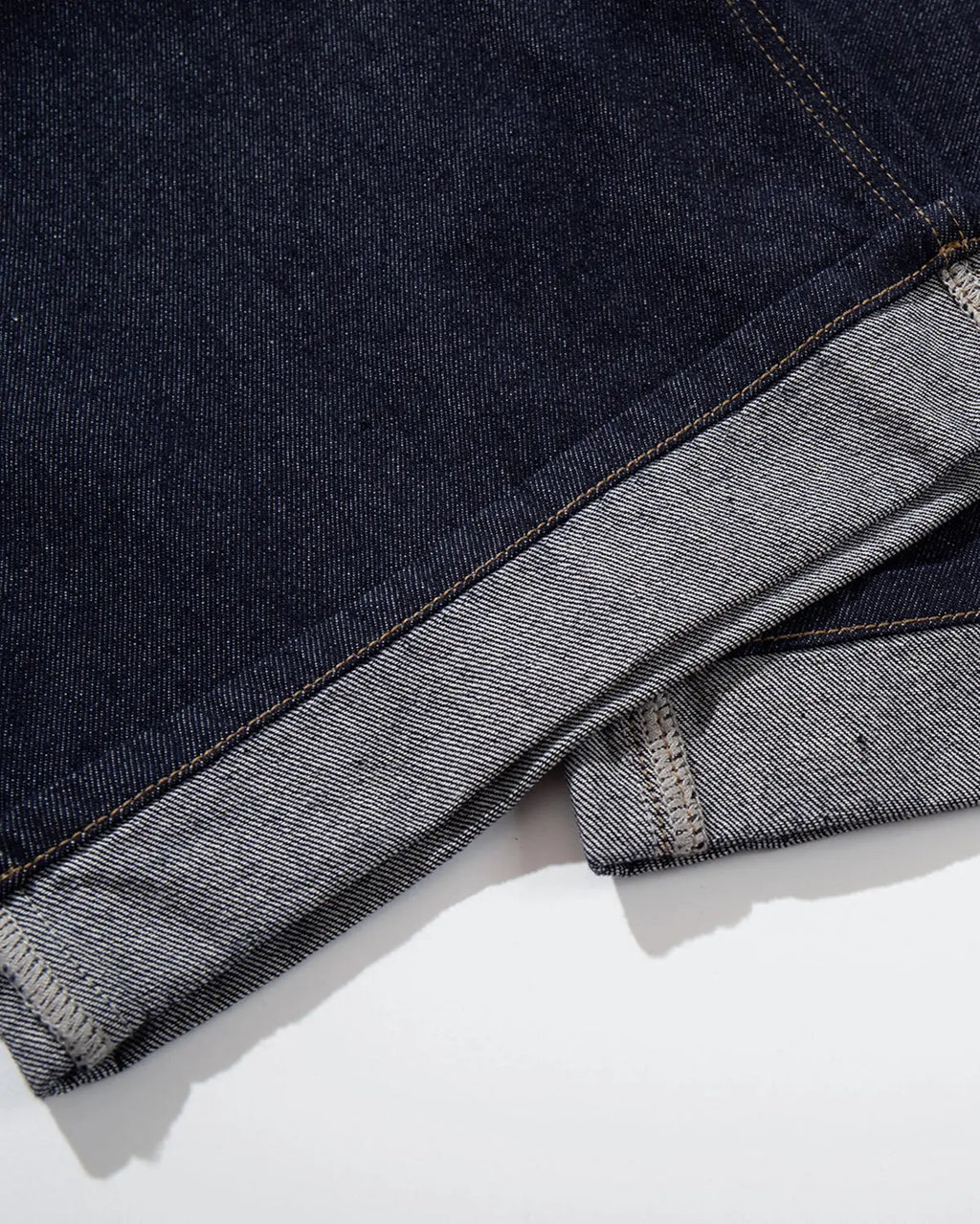 Raw blue Cinch Back Baggy Denim Jorts by Flation Streetwear, showcasing relaxed fit and distressed denim style.