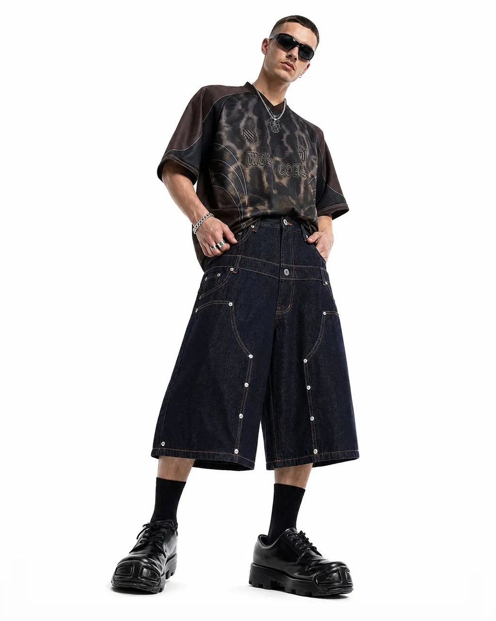 Blue double waist rivet baggy jorts by Flation, casual streetwear pants with distressed denim and rivet details.