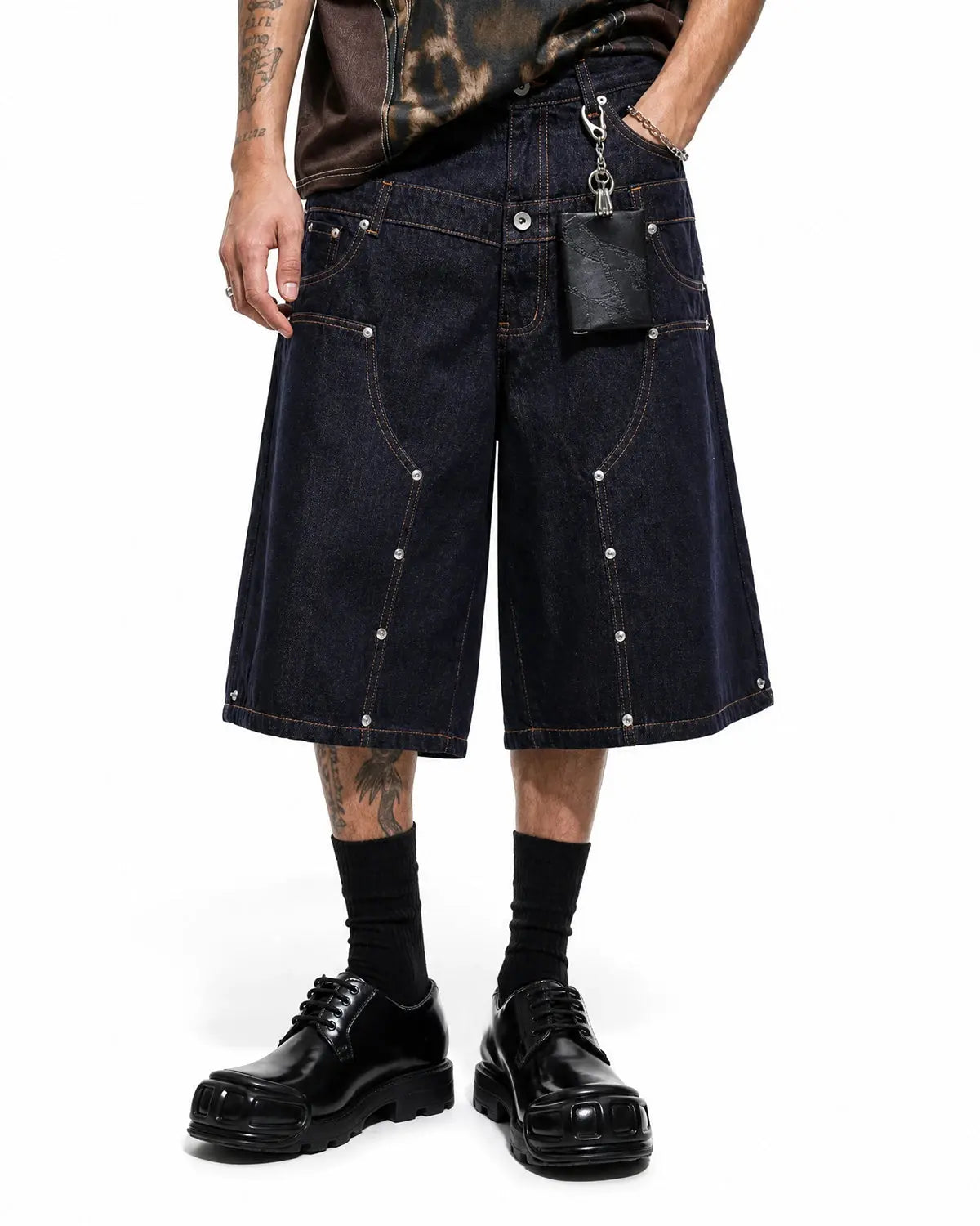 Blue double waist rivet baggy jorts by Flation, raw denim streetwear pants with rivet details and relaxed fit.