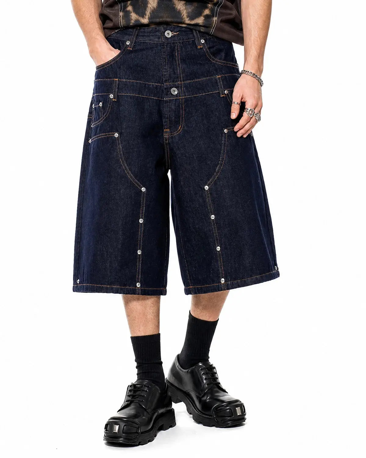 Blue raw denim double waist rivet baggy jorts by Flation, streetwear pants featuring a relaxed fit and rivet details.
