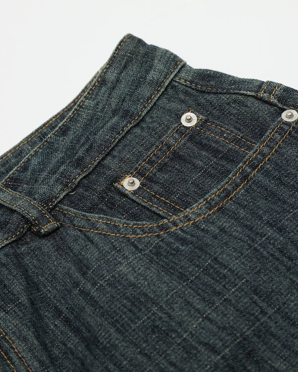 Raw wide-leg long jorts by Flation Streetwear, showing beige denim pants with distressed edges and a relaxed fit.