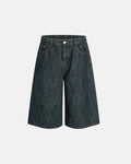 Raw wide-leg long jorts by Flation Streetwear, featuring distressed denim and relaxed fit, styled with rolled cuffs.