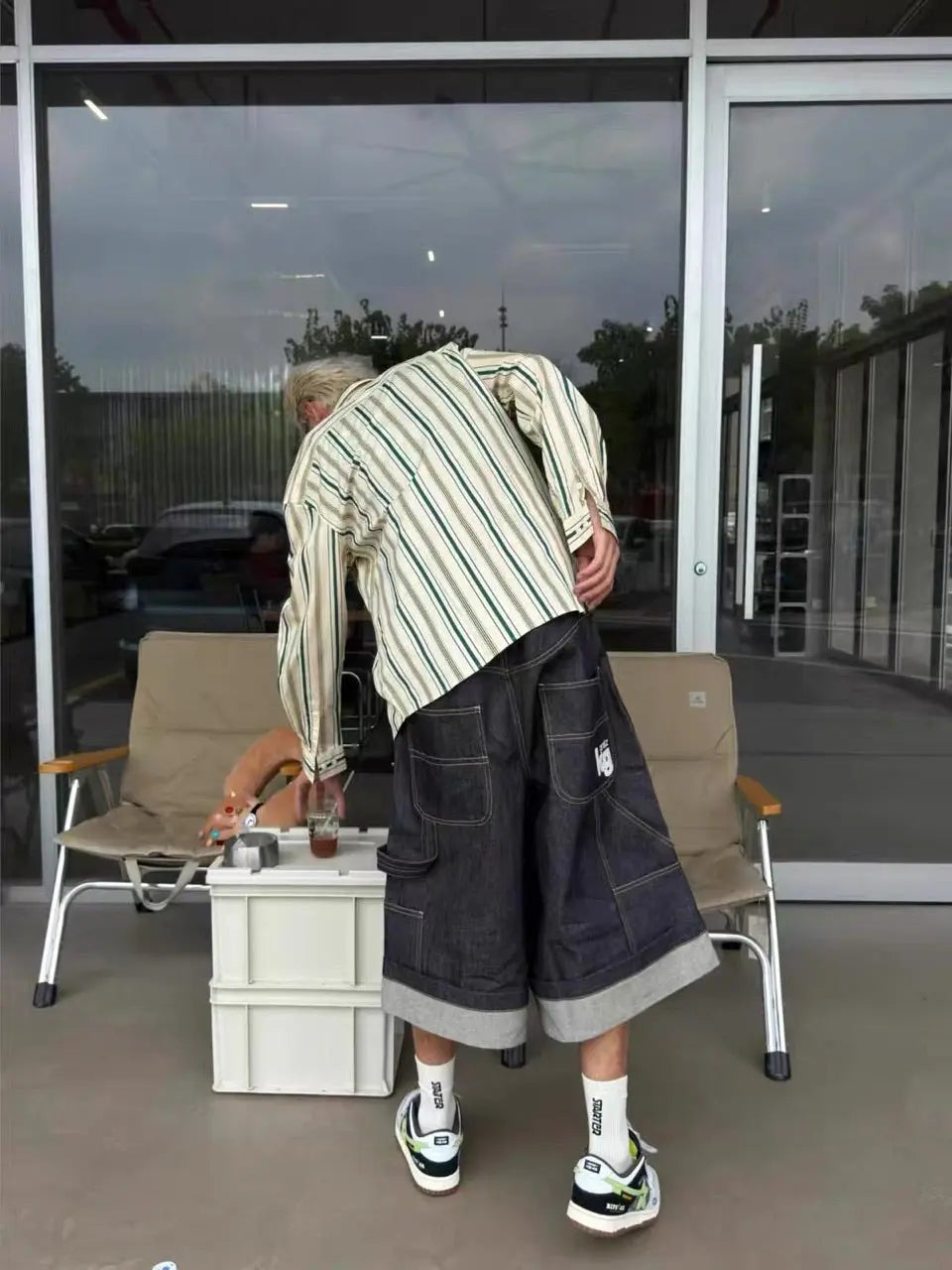 Raw denim carpenter long jorts by Flation Streetwear, featuring rugged denim fabric and functional side pockets.