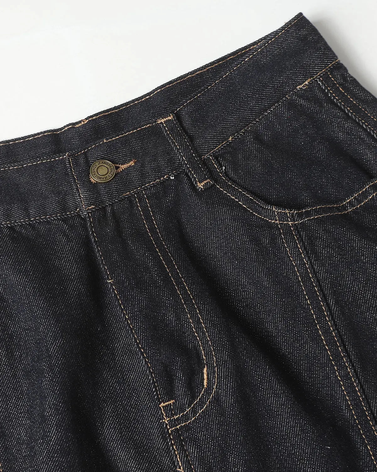 Deconstructed Scimitar Denim Longline Jorts by Flation Streetwear, showing raw edge details and distressed denim pants.