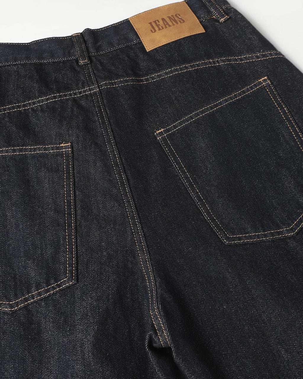 Deconstructed Scimitar Denim Longline Jorts by Flation Streetwear, raw distressed denim pants with a longline fit and unique design details.