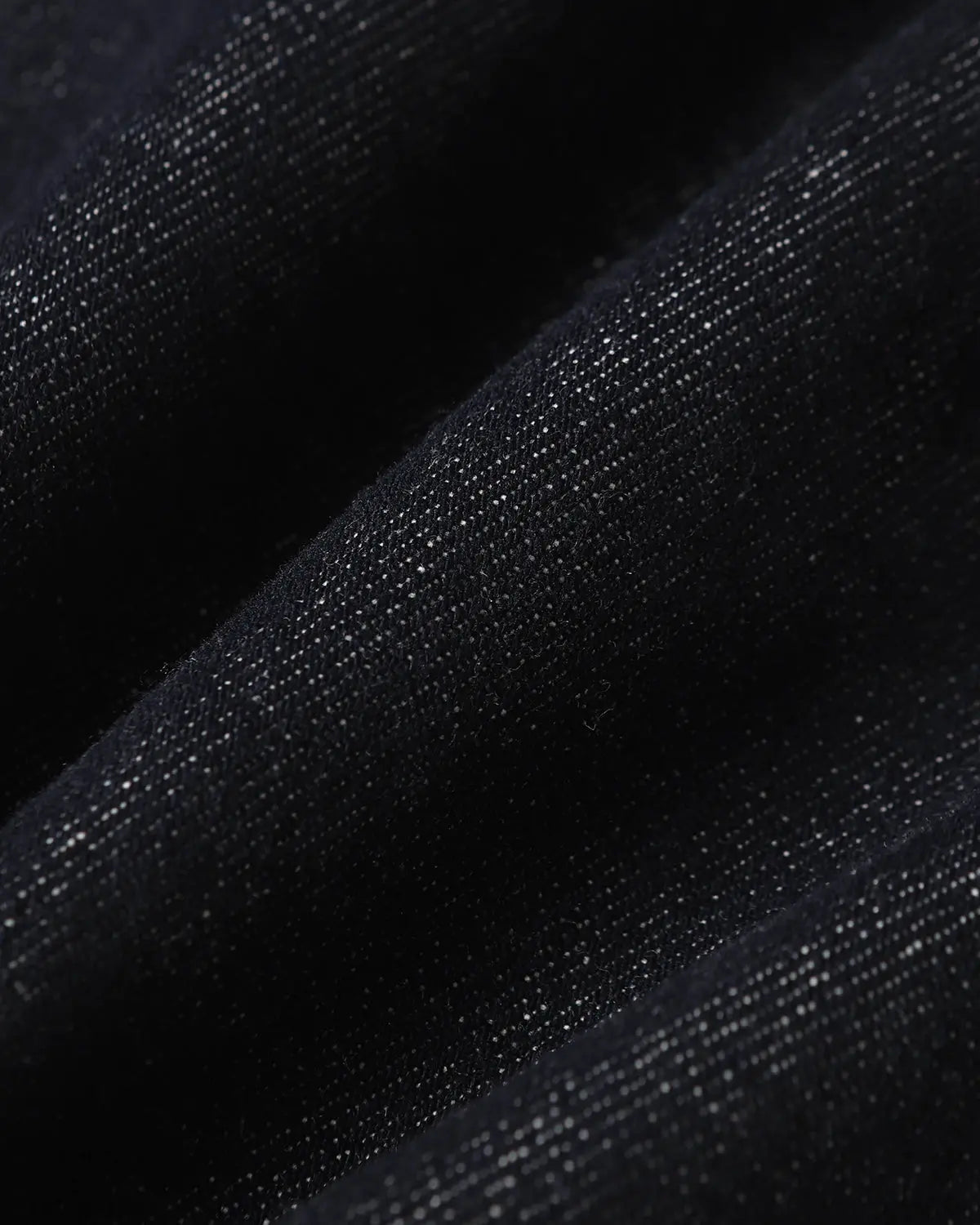 Deconstructed Scimitar denim longline jorts by Flation Streetwear, showing distressed raw denim pants with frayed edges and a relaxed fit.
