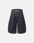 Deconstructed Scimitar Denim Longline Jorts by Flation Streetwear, showcasing raw hem and distressed detailing on stylish pants.