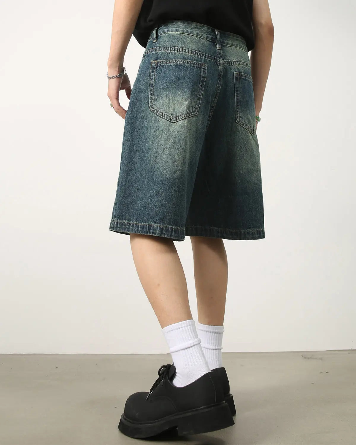 Blue washed knee-length denim jorts by Flation Streetwear, casual pants with a relaxed fit and retro style.