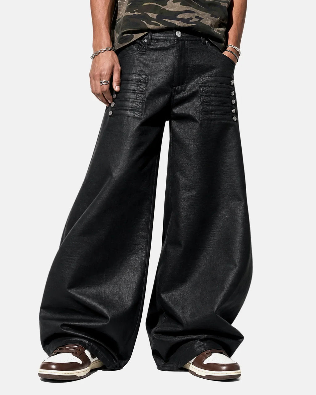 Black graphic wide-leg pants by Flation Streetwear featuring bold graphic designs and a relaxed, wide-leg fit.