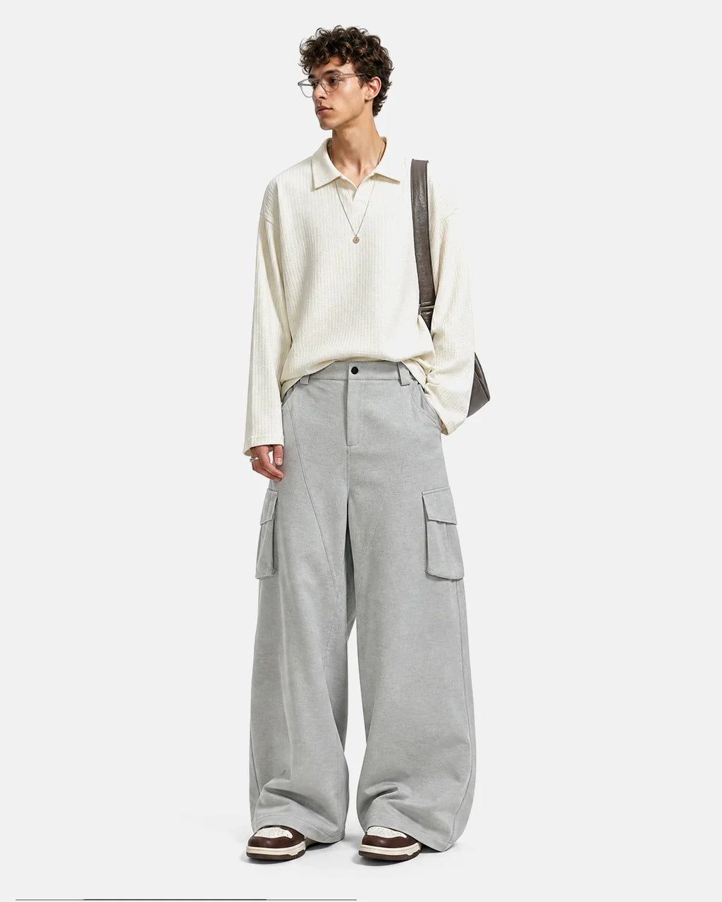 Gray structured wide-leg cargo pants by Flation Streetwear, featuring a relaxed fit and multiple utility pockets.