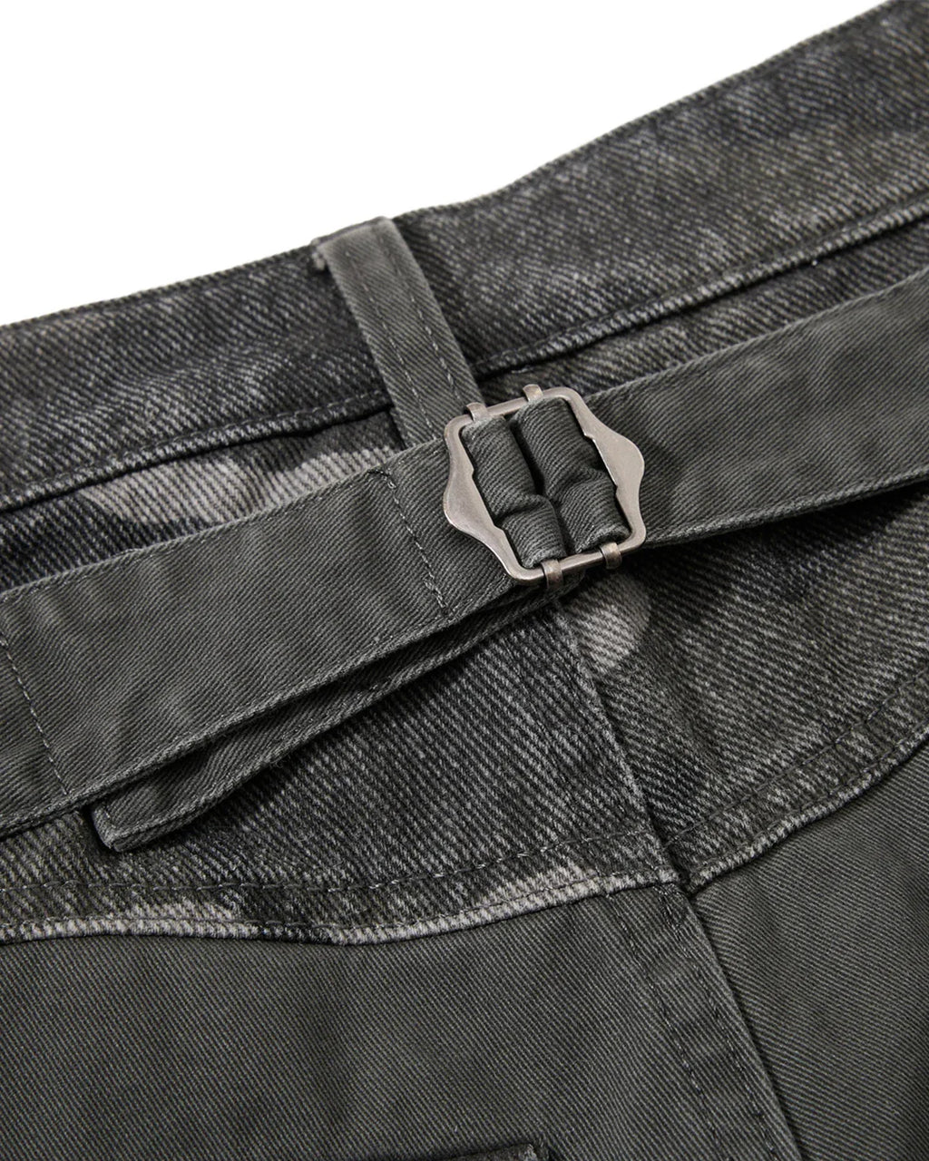 Green camo patchwork barrel pants by Flation Streetwear, showcasing a relaxed fit and stylish streetwear design.
