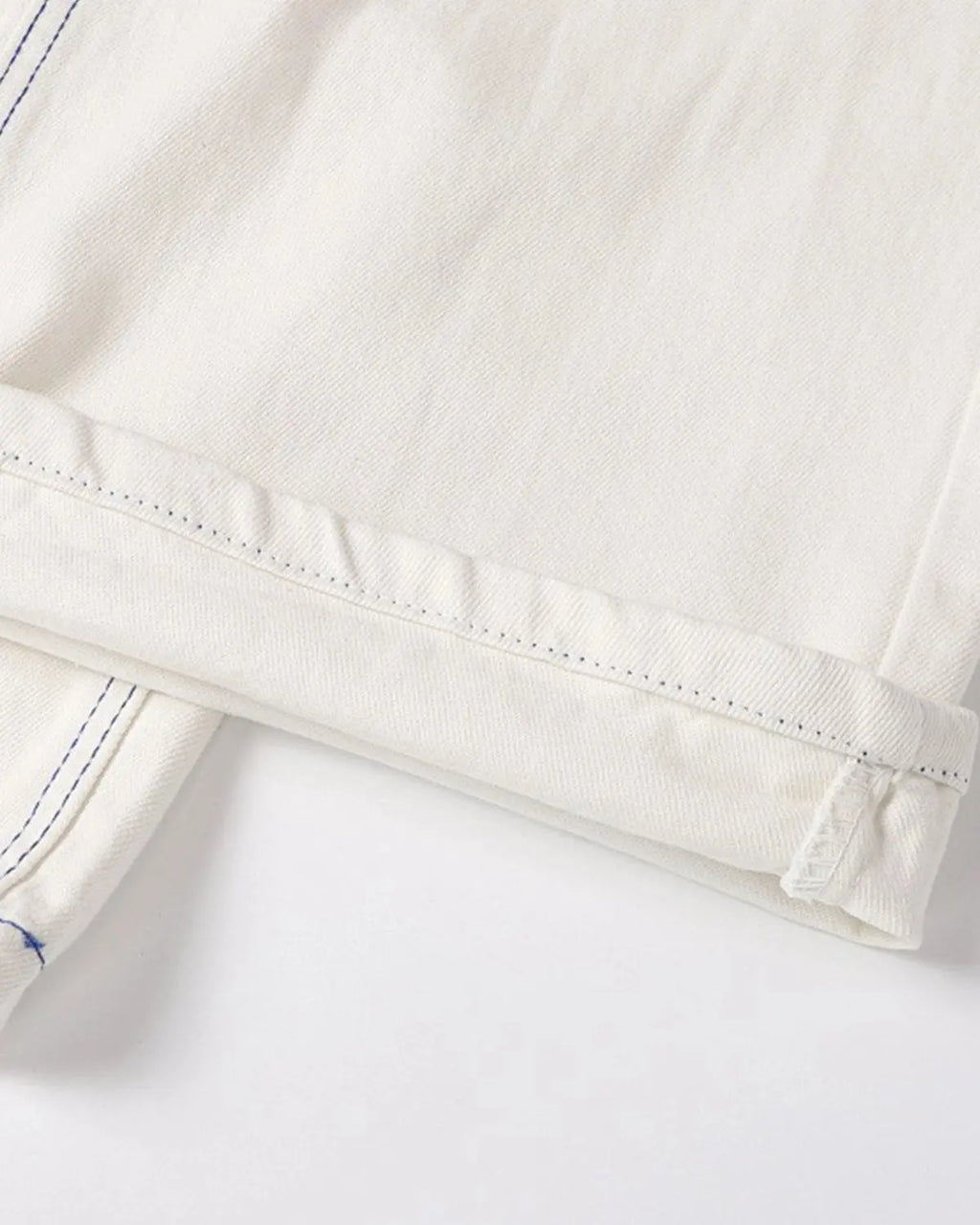 White contrast stitch baggy jeans by Flation Streetwear, relaxed fit pants with trendy details and spacious design.
