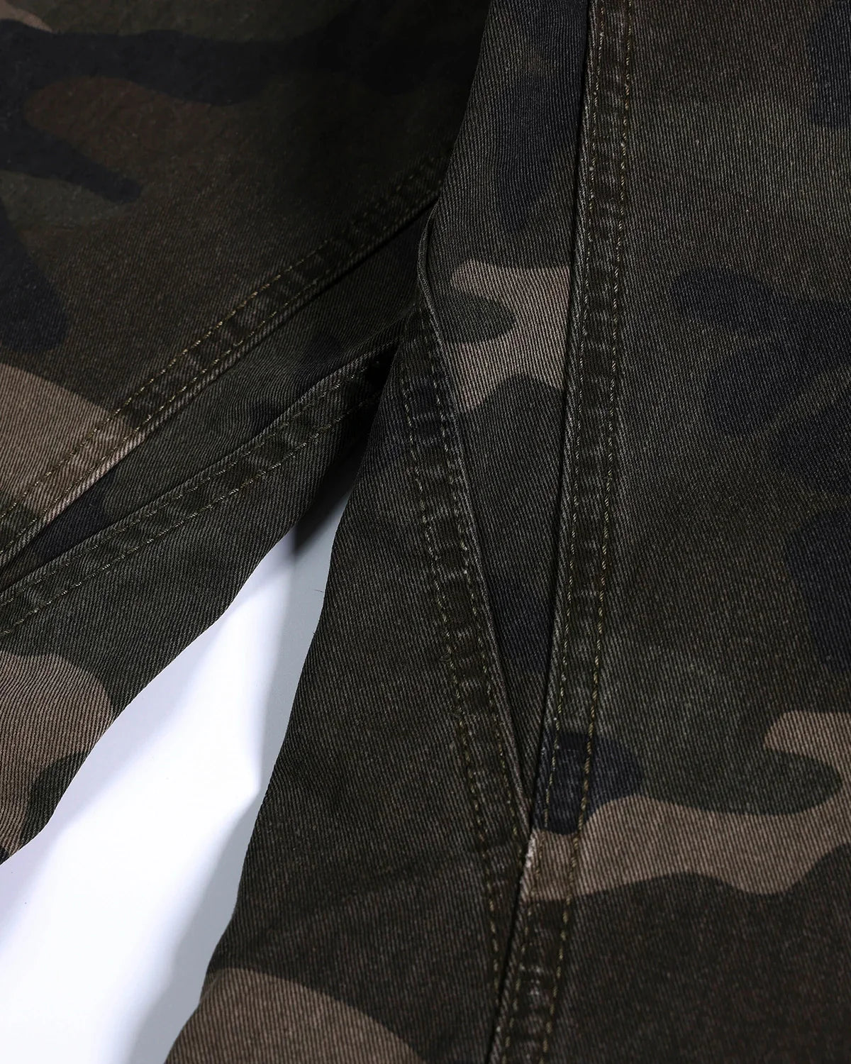 Flation Studded Camo Barrel Jeans, stylish streetwear pants with metal studs and camouflage pattern, casual urban fashion.