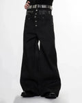Black double waist raw super baggy jeans from Flation Streetwear, featuring a loose fit and raw hem details.