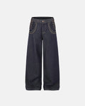 Black side lace-up raw baggy jeans by Flation Streetwear featuring a relaxed fit and distressed raw denim style.