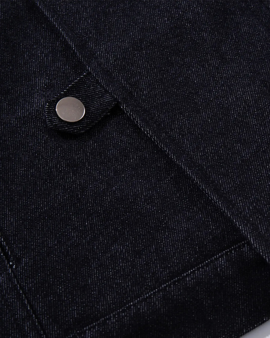 Raw blue denim Fireman Clasp jacket by Flation with front button closure and streetwear style, shown on a hanger.