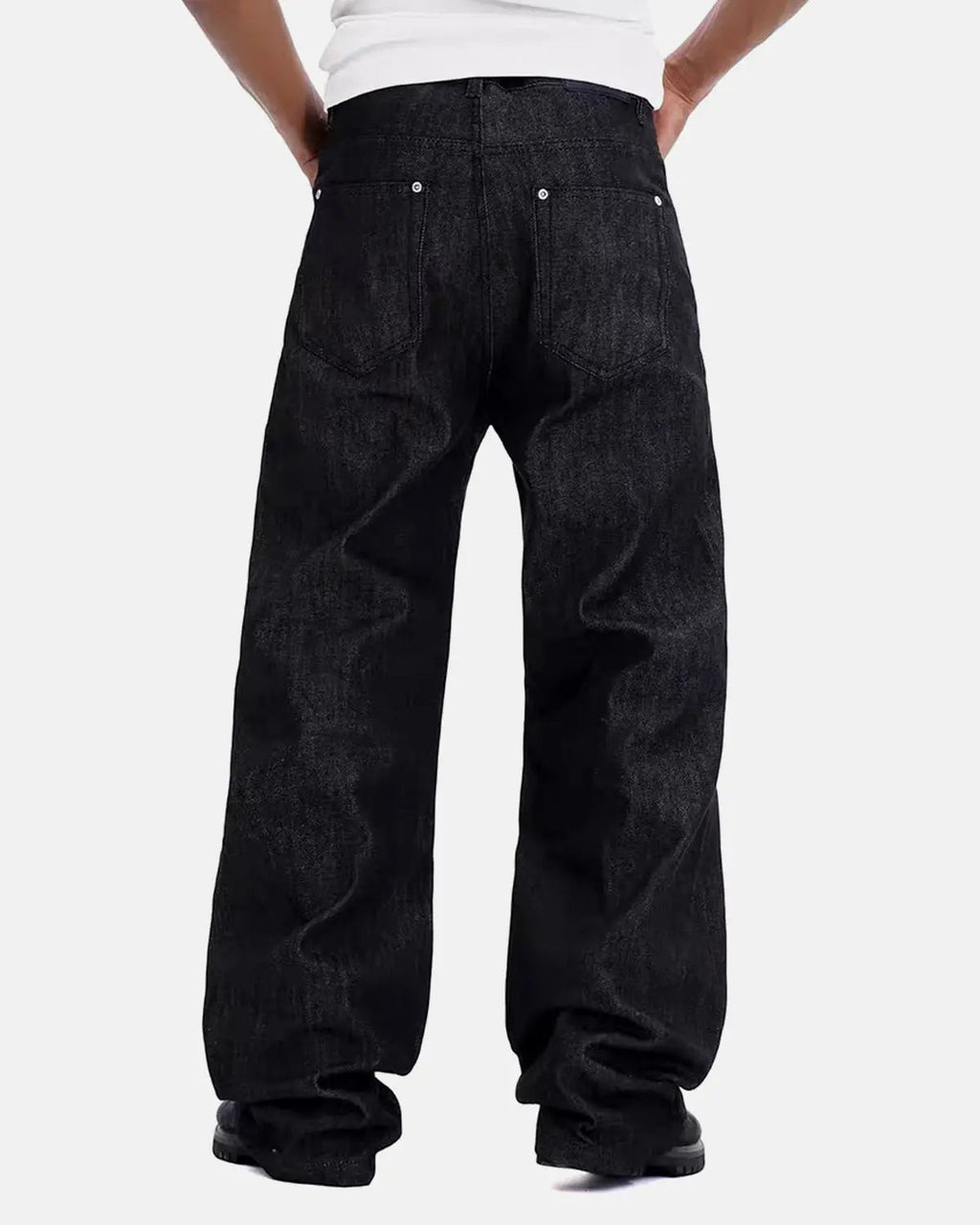 Raw baggy jeans with button details from Flation Streetwear, featuring a relaxed fit and casual streetwear style.