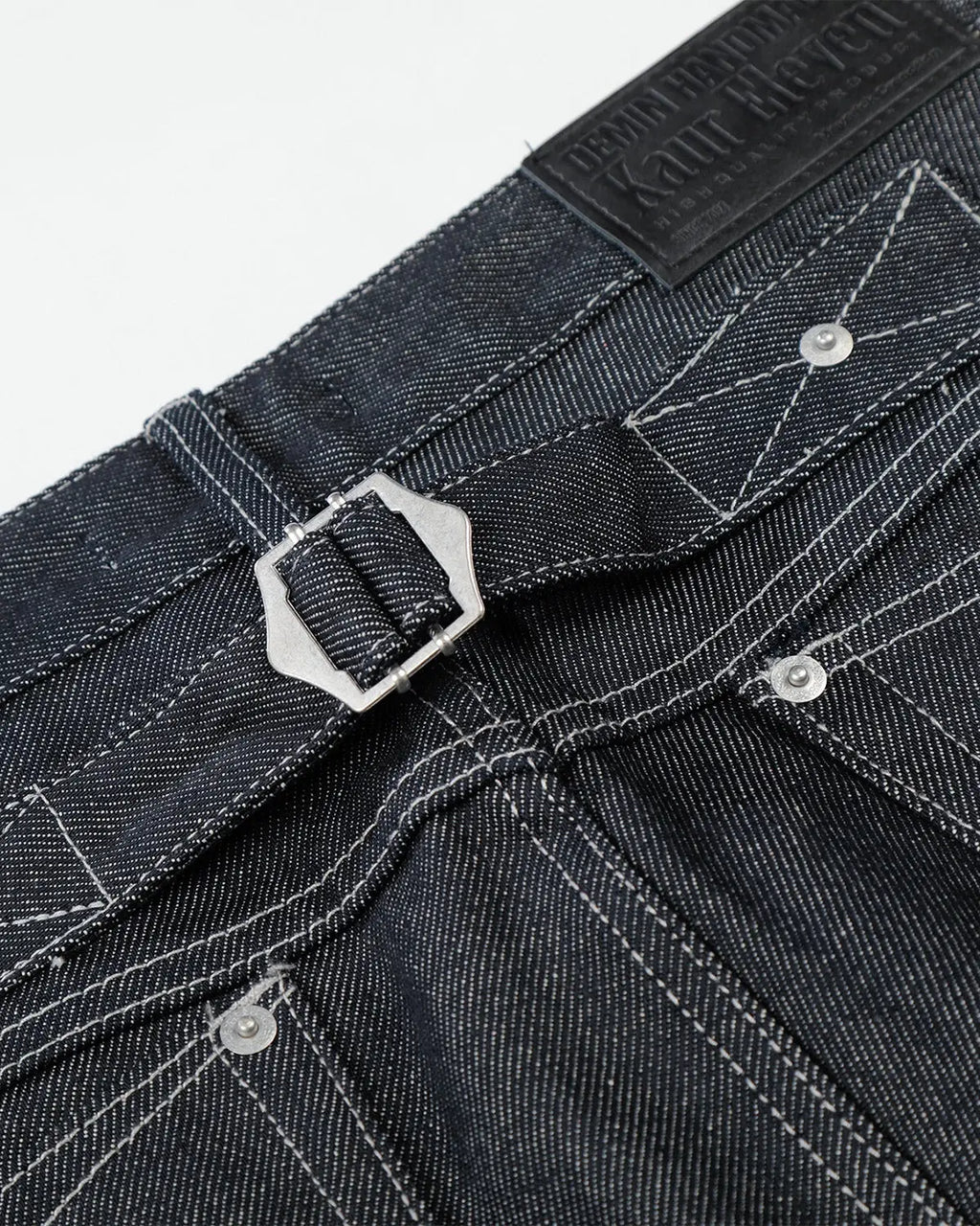 Raw baggy jeans from Flation with contrast stitching and streetwear style, featuring a relaxed fit and distressed detailing.
