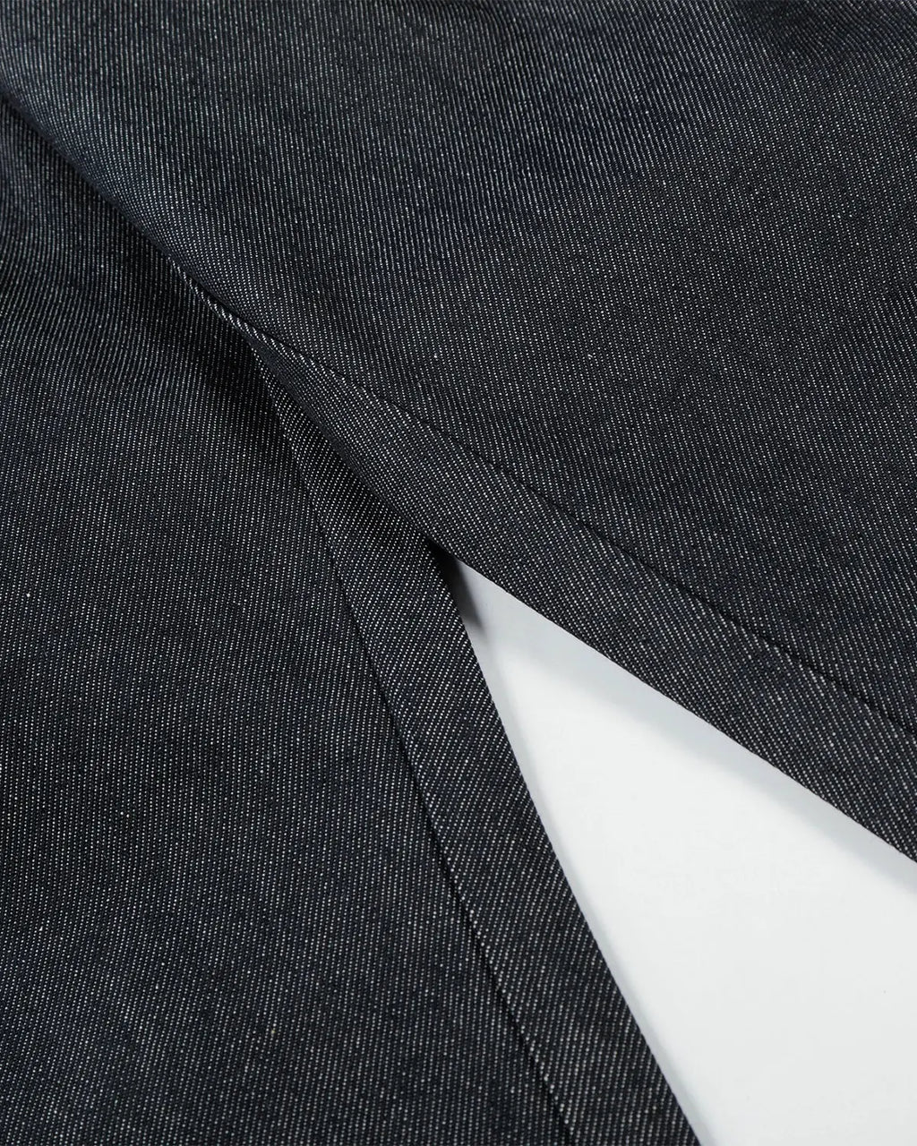 Raw baggy jeans with contrast stitching from Flation Streetwear, featuring a relaxed fit and distressed denim style.