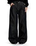 Raw baggy jeans with contrast stitching by Flation Streetwear, showing relaxed fit and detailed stitching on denim fabric.