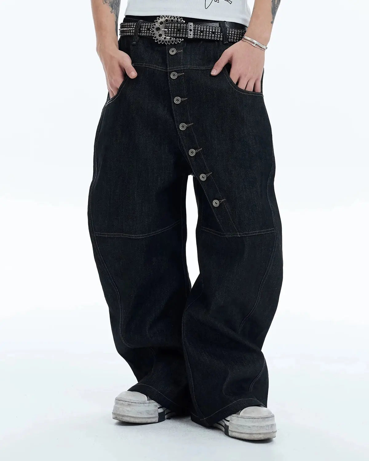 Raw baggy jeans by Flation Streetwear featuring button-up front, relaxed fit, and casual streetwear style.