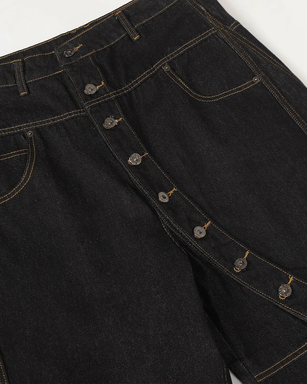 Flation Raw Baggy Jeans with button-up front and relaxed fit, featuring distressed details and streetwear style.
