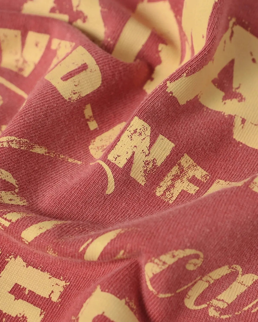Washed patchwork graphic T-shirt by Flation featuring colorful patchwork design and streetwear style.