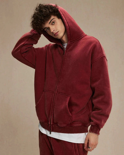 Acid washed distressed fleece zip-up hoodie by Flation, featuring a relaxed fit, hood, and distressed details on soft fabric.