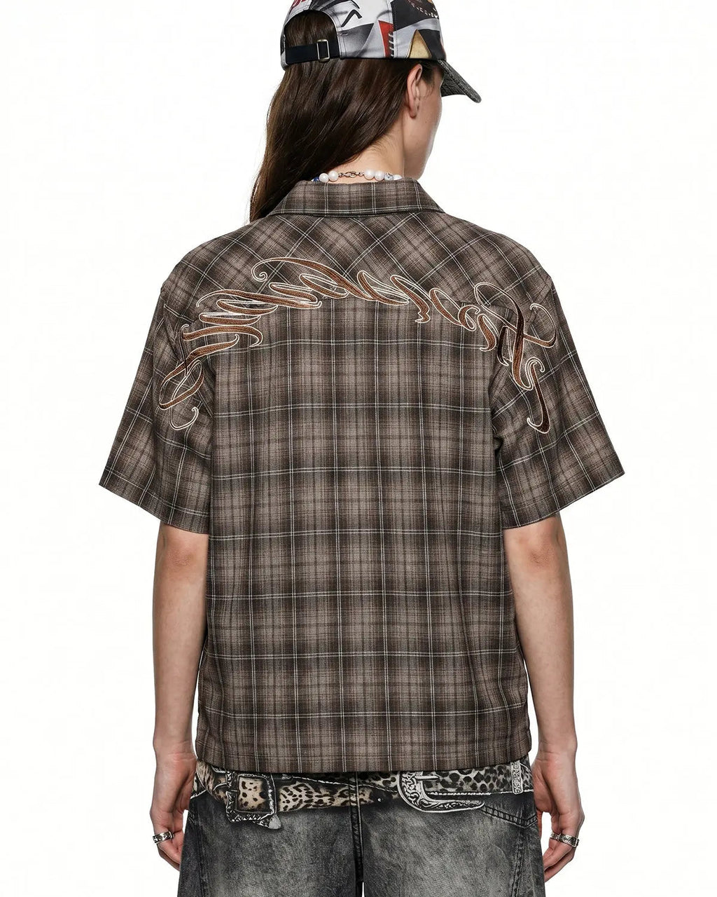 Flation plaid script embroidered shirt with long sleeves and button-front, featuring a stylish plaid pattern and embroidered design.