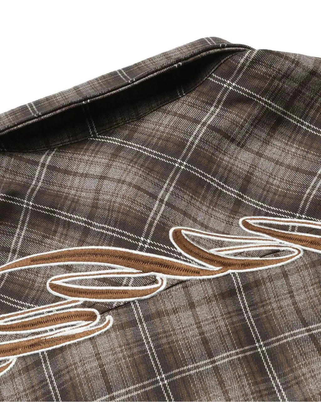 Flation plaid script embroidered shirt featuring a classic checkered pattern and detailed embroidery on the front.
