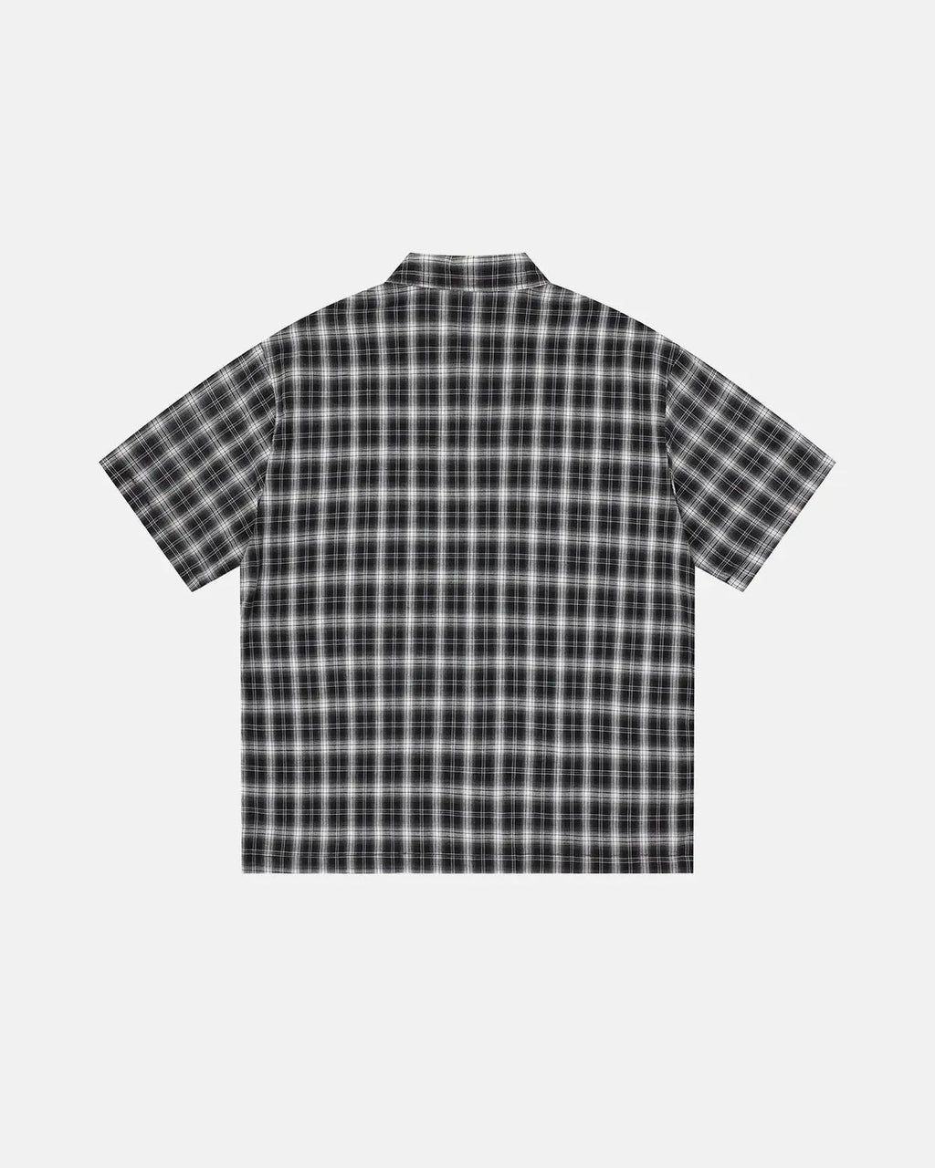 Flation plaid sticker graphic studded shirt featuring a bold plaid pattern and metal stud details on a streetwear style shirt.