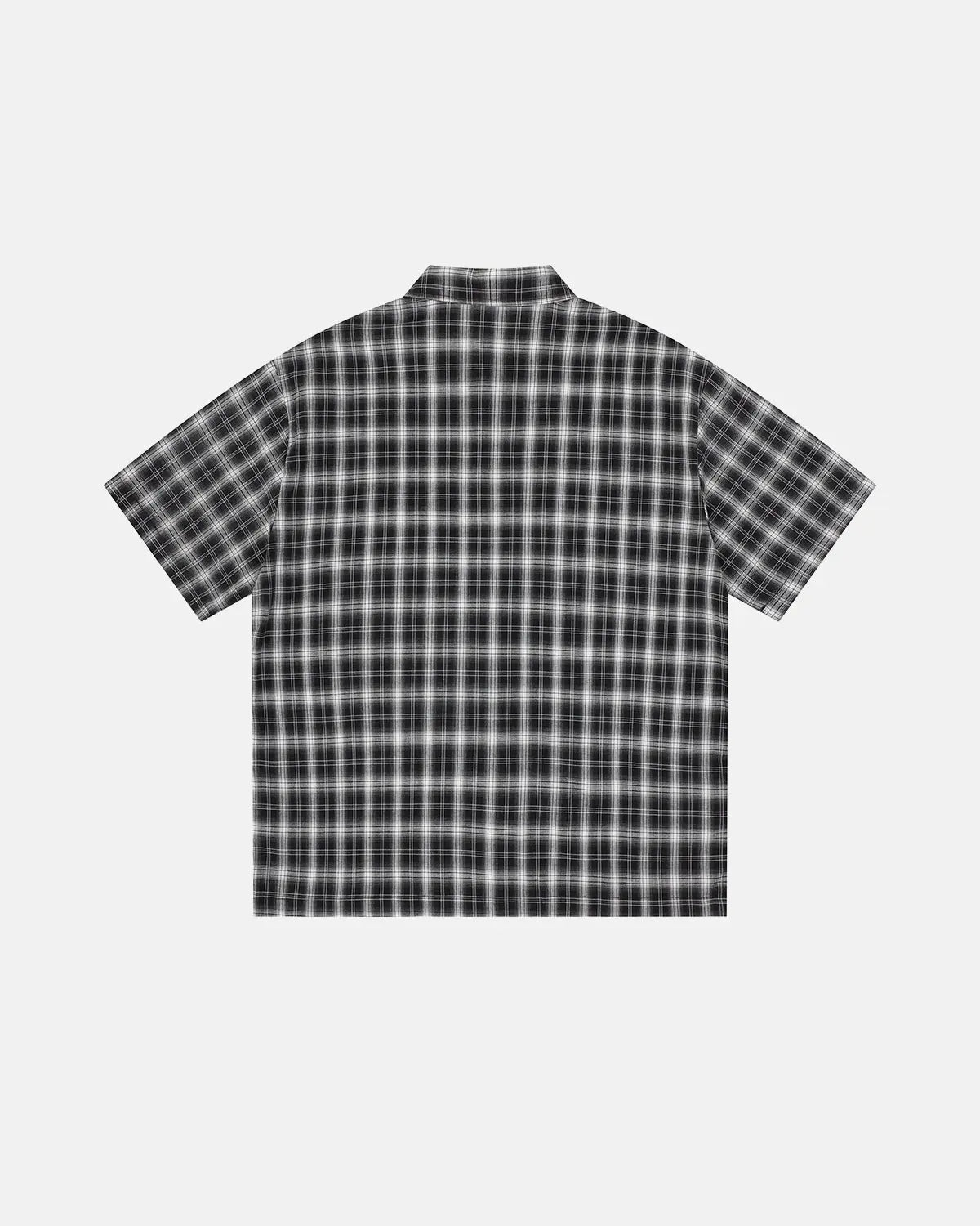 Flation plaid sticker graphic studded shirt featuring a bold plaid pattern and metal stud details on a streetwear style shirt.