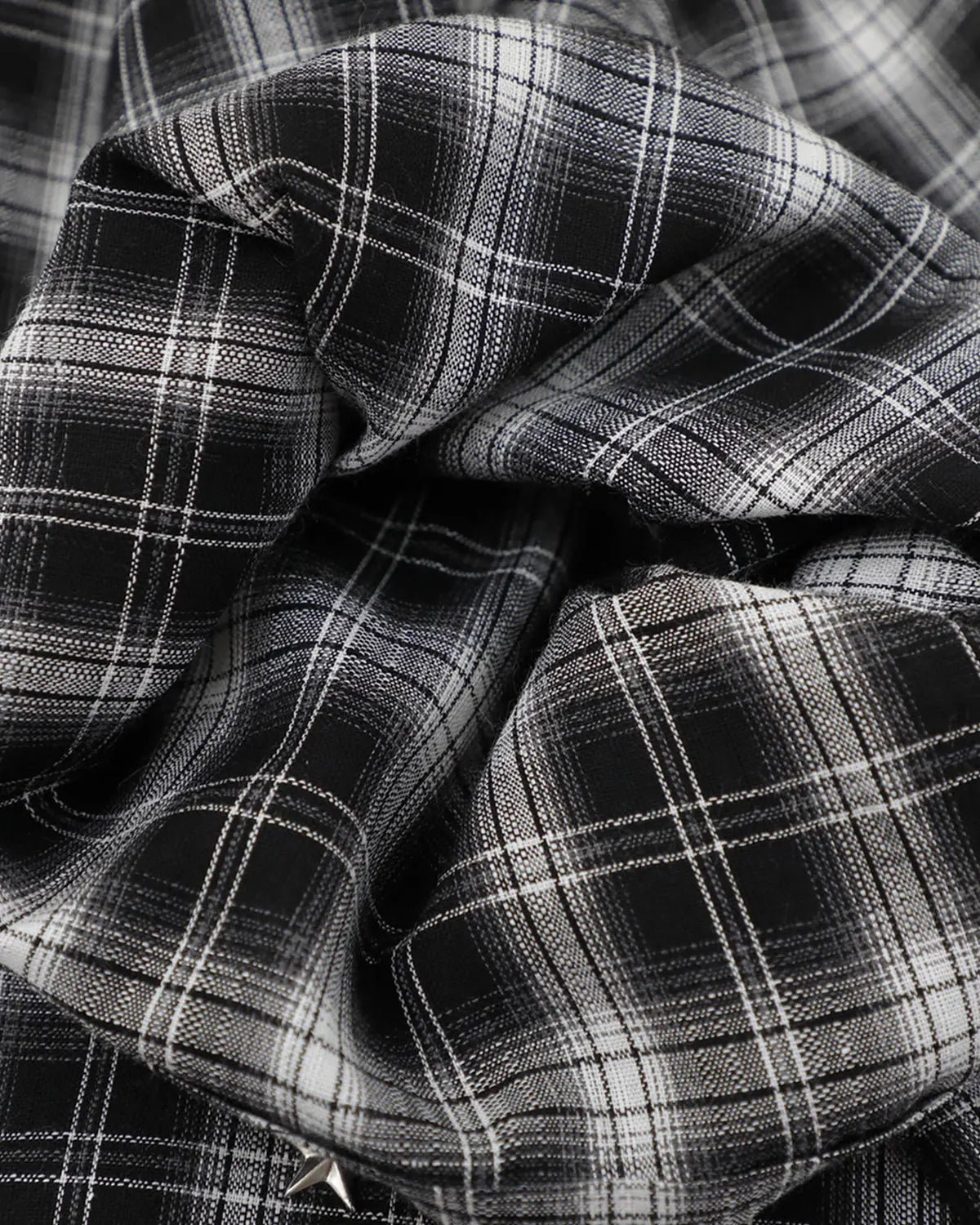 Flation plaid sticker graphic studded shirt featuring a classic plaid pattern, studded accents, and streetwear style.