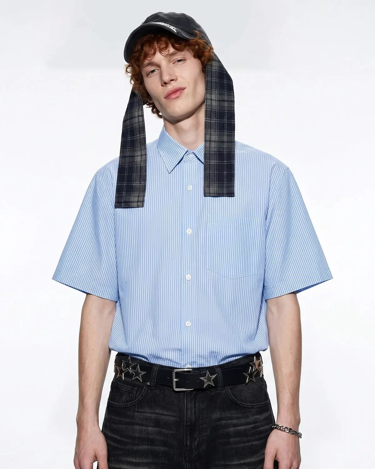 Black Flation boxy striped short-sleeve shirt with a relaxed fit and bold horizontal stripes, casual streetwear style.