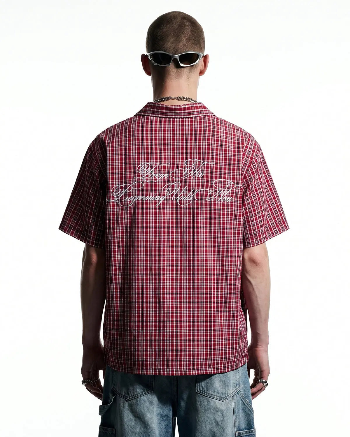 Flation plaid script embroidered short-sleeve shirt featuring a classic design with embroidered branding on the chest.