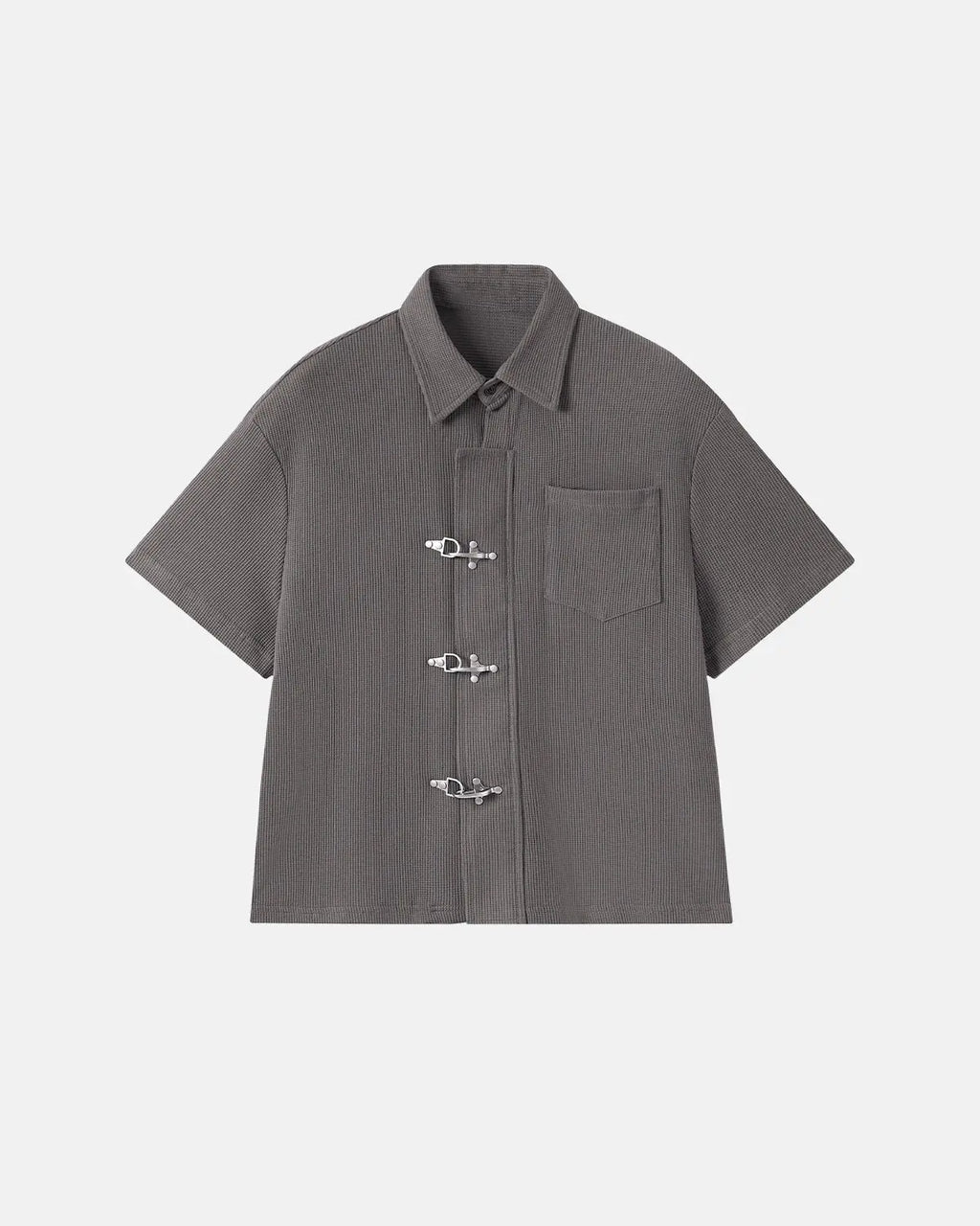 Dark gray Flation streetwear waffle shirt with metal clasp detail, casual fit, and textured fabric.
